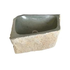Rectangular handcrafted river stone sink with polished interior and rough exterior