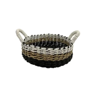 Handwoven natural fiber basket with handles made from organic materials