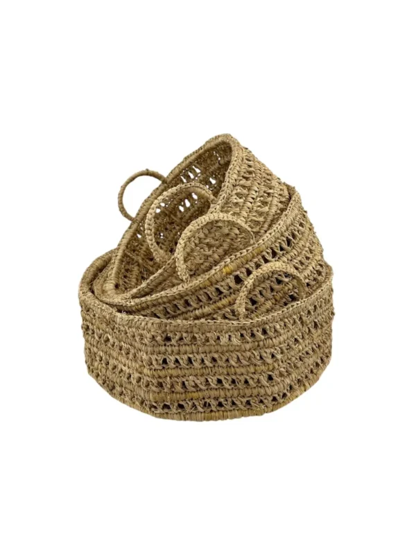 Handwoven natural fiber basket set with handles made from organic materials