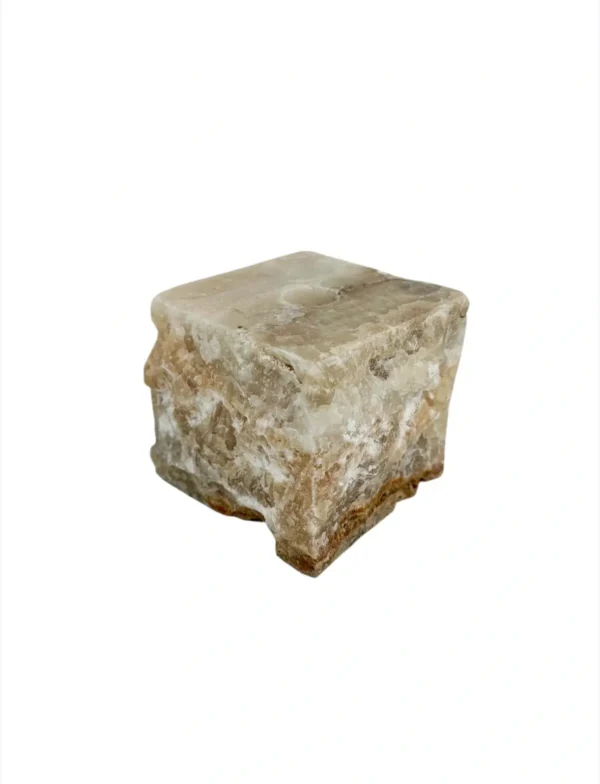 Handmade onyx candle holder carved from natural stone with unique mineral patterns