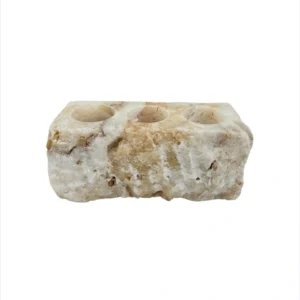 Handmade onyx candle holder carved from natural stone with unique mineral patterns