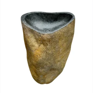 Natural riverstone pedestal sink with polished interior and rustic outer surface
