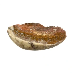 Handcrafted natural onyx bowl with polished finish and warm beige tones