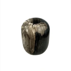 Handmade petrified wood vase with polished surface and natural fossil patterns.