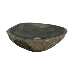 Handcrafted river stone sink with polished interior and natural exterior finish, unique organic stone wash basin.
