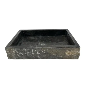 handmade rectangular marble sink with raw textured exterior