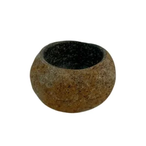Handcrafted natural river stone bowl with polished interior and textured exterior