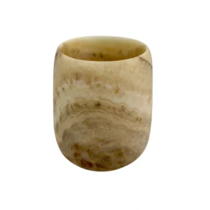 Handmade onyx candle holder carved from natural stone with unique mineral patterns