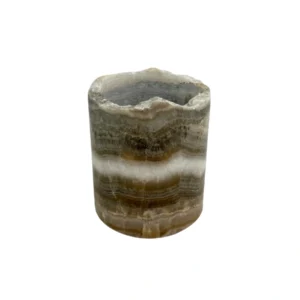 Handmade onyx candle holder carved from natural stone with unique mineral patterns