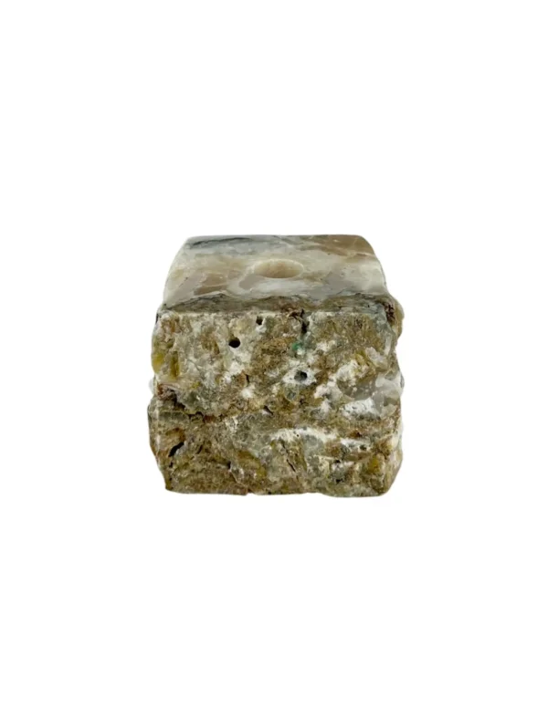 Handmade onyx candle holder carved from natural stone with unique mineral patterns