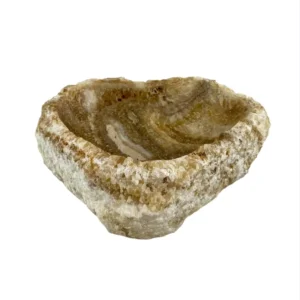 Handcrafted natural onyx bowl with polished finish and warm beige tones